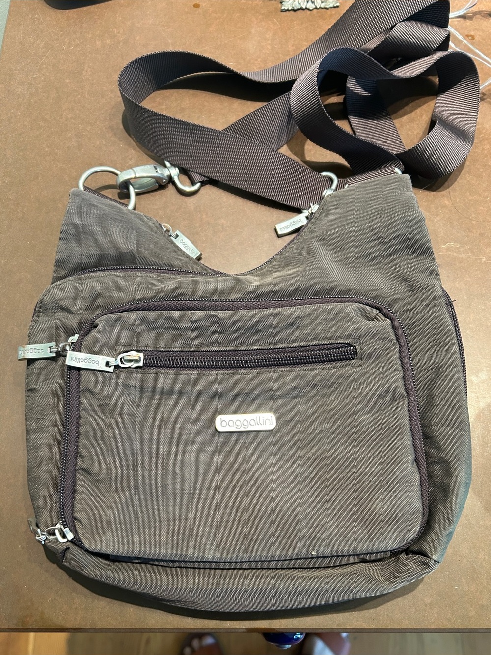 Baggallini crossbody travel purse bag in dark Brown. Excellent condition.